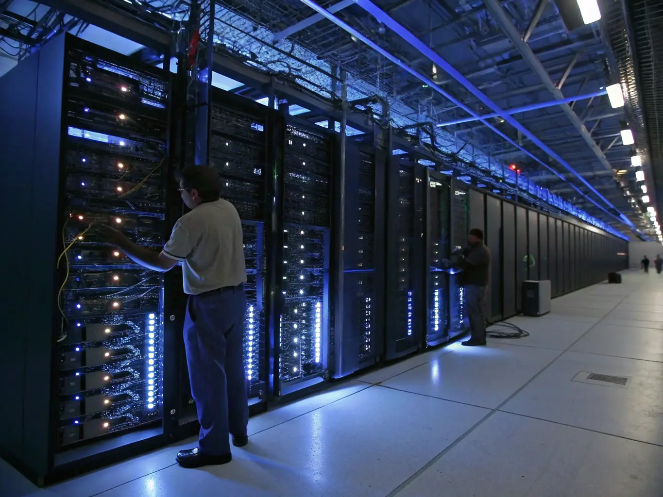 A modern data center interior with neatly organized fiber optic cables and equipment, symbolizing the ability to upgrade infrastructure immediately with Affirm financing.