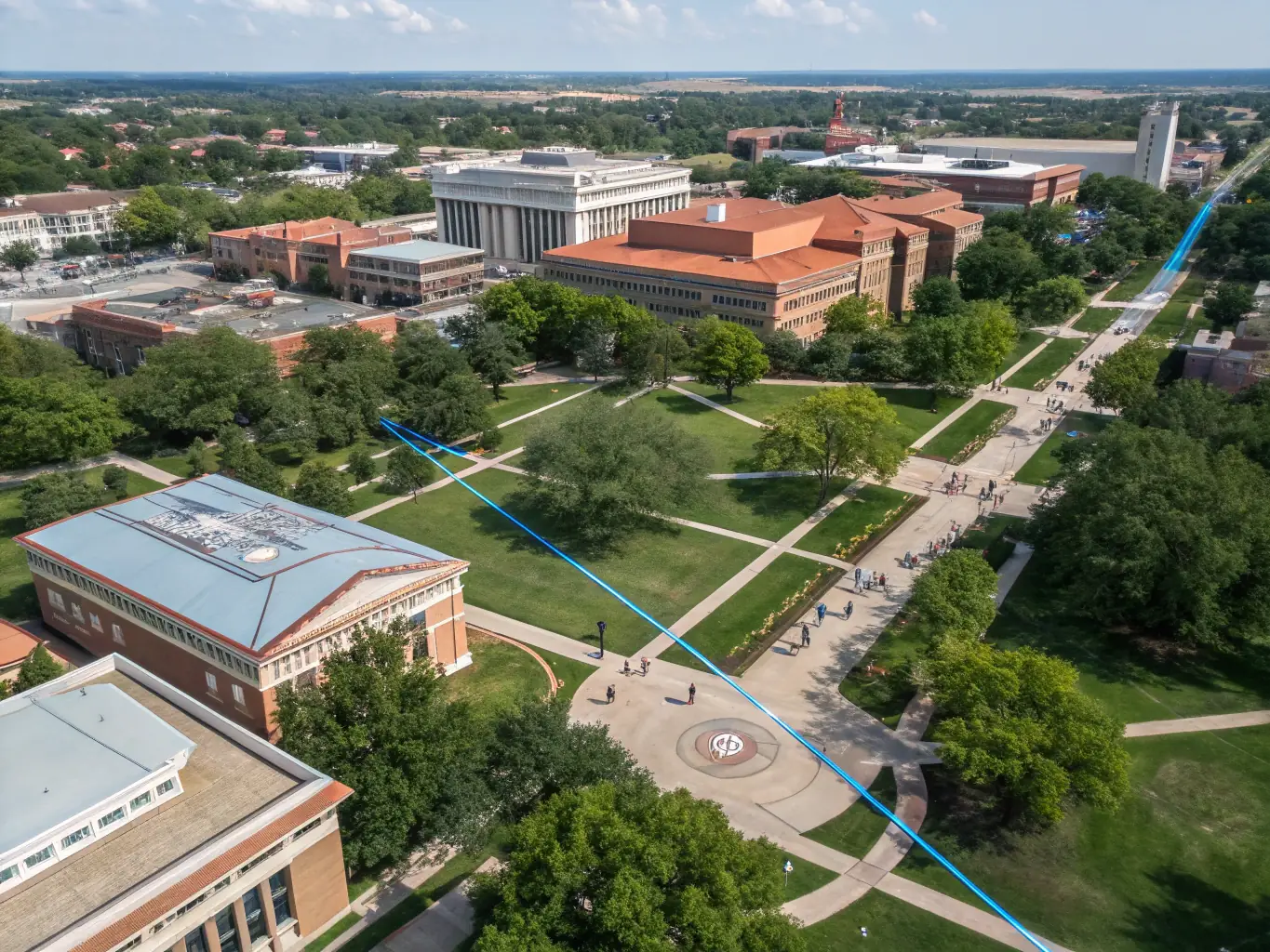 An image depicting a university campus with fiber optic cables connecting different academic buildings, highlighting the importance of reliable connectivity for educational institutions.